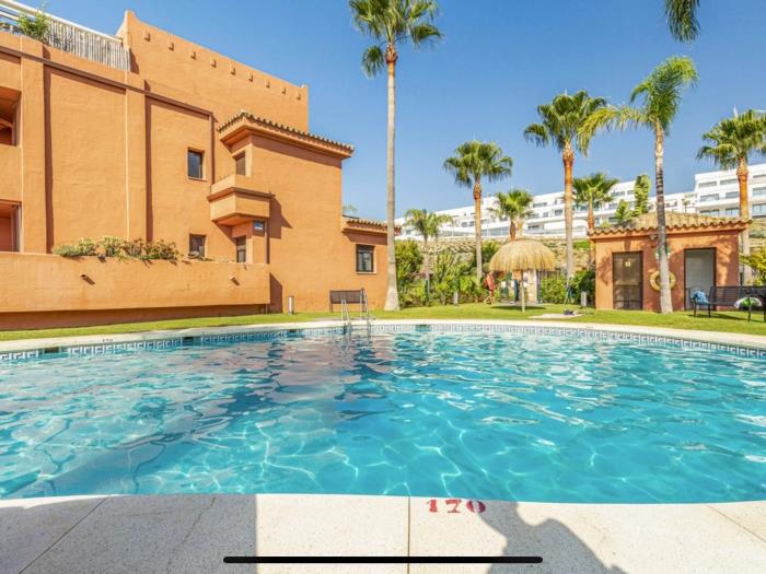 Wohnung mit Schwimmbad und Meerblick
